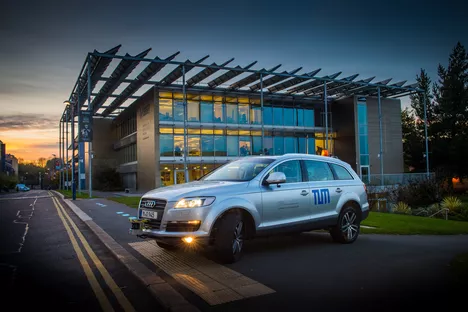 Audi Q7 with enhanced sensor setup during teleoperated test drive